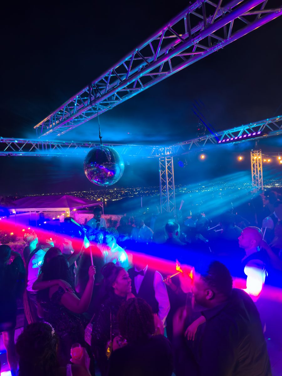Rooftop party with disco ball and lighting